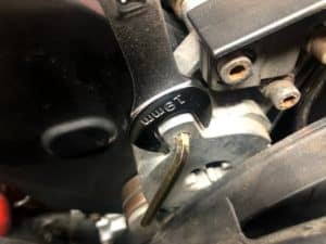 Remove serp bet tension so you can remove the tensioner and timing cover